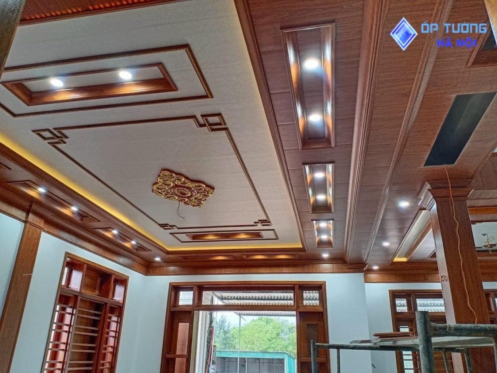 a ceiling with lights and wood paneling