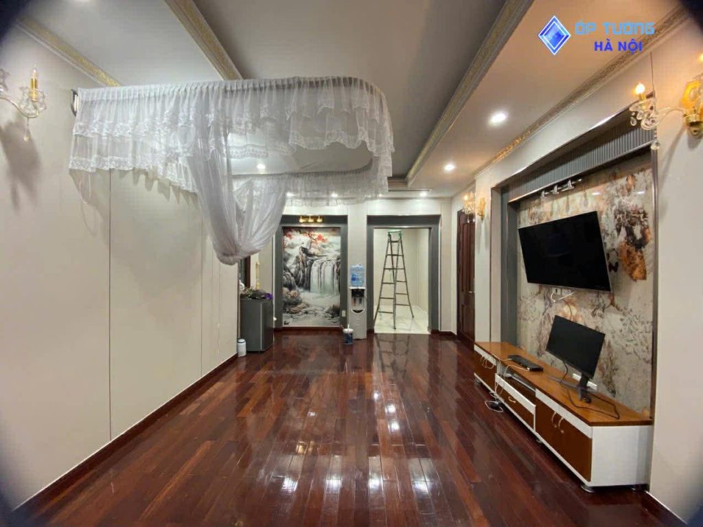 Thiết kế thi công cải tạo không gian phòng khách bằng ốp tường nhựa pvc tại chung cư Gamuda Land tại Hà Nội