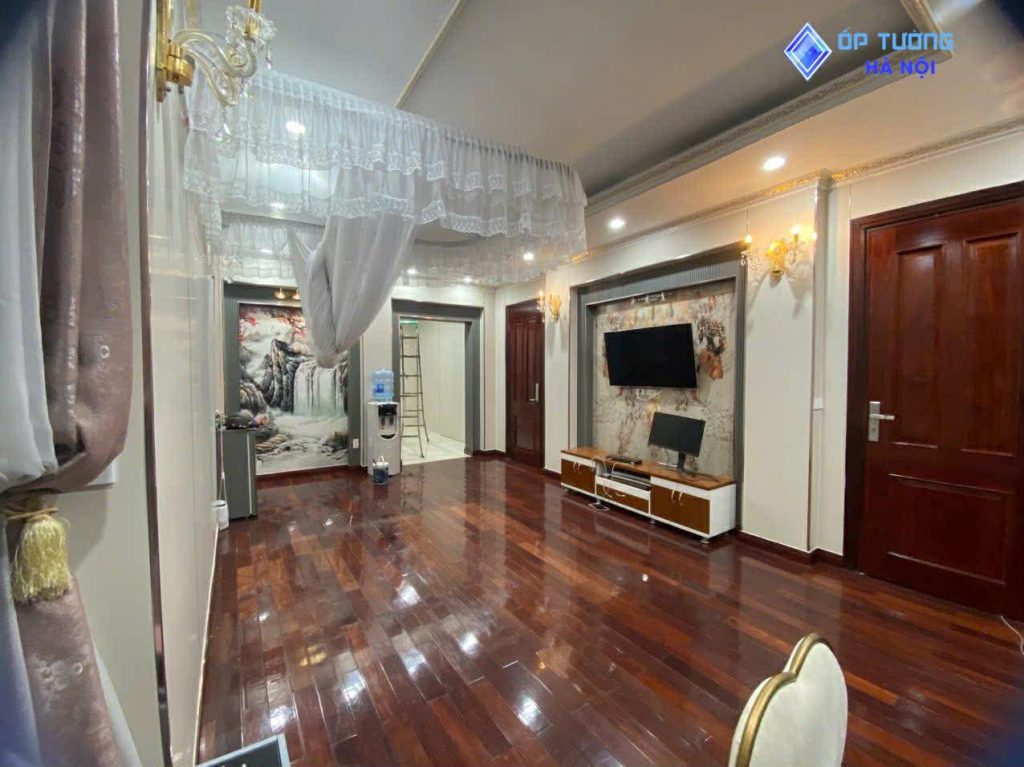 Thiết kế thi công cải tạo không gian phòng khách bằng ốp tường nhựa pvc tại chung cư Gamuda Land tại Hà Nội