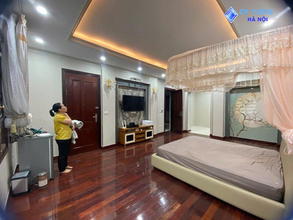 Thiết kế thi công cải tạo không gian phòng khách bằng ốp tường nhựa pvc tại chung cư Gamuda Land tại Hà Nội